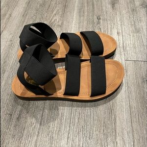Strappy black sandals
